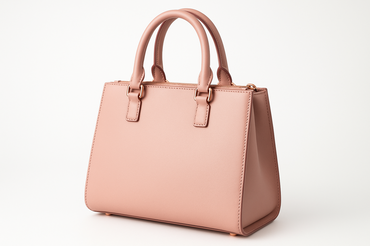 Blush pink leather handbag - three-quarter angle view